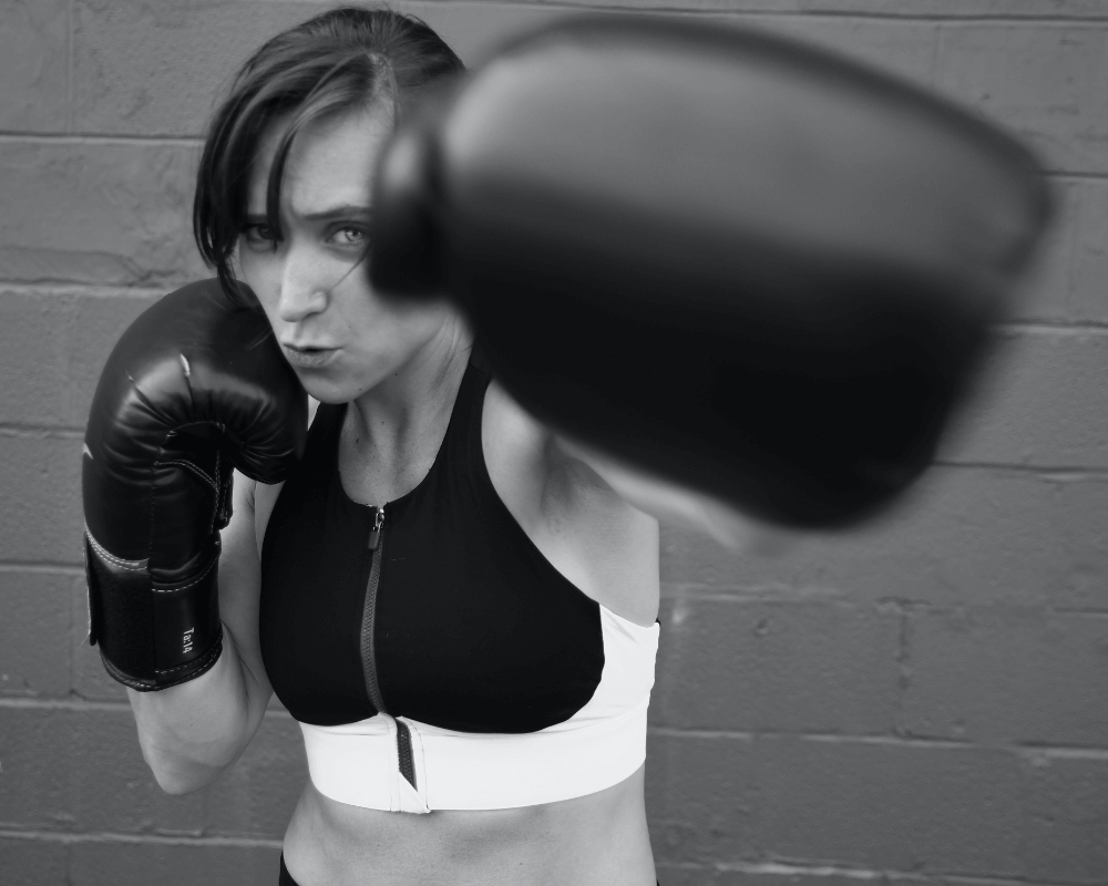 Female boxer posing