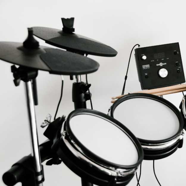 Side view of an electric drum set.