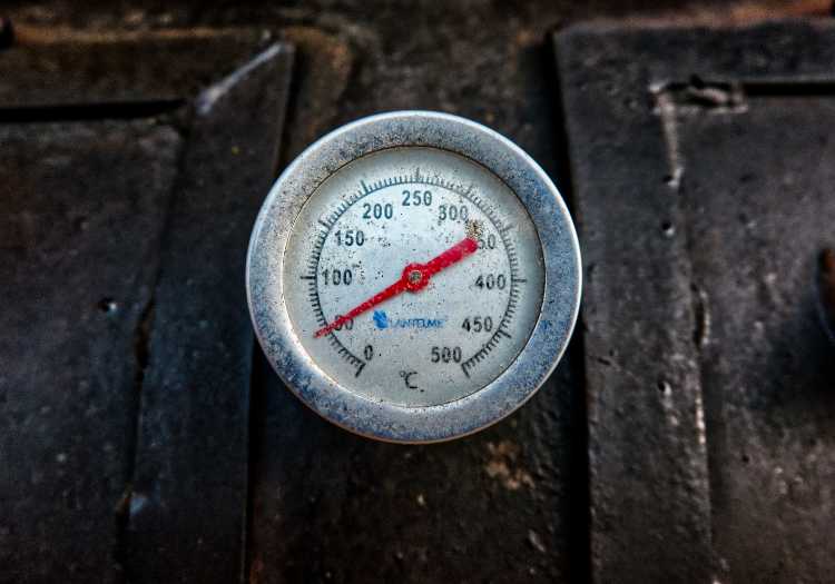 Grill thermometer heating up to the ideal temp!