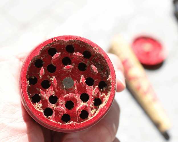 A empty red weed grinder