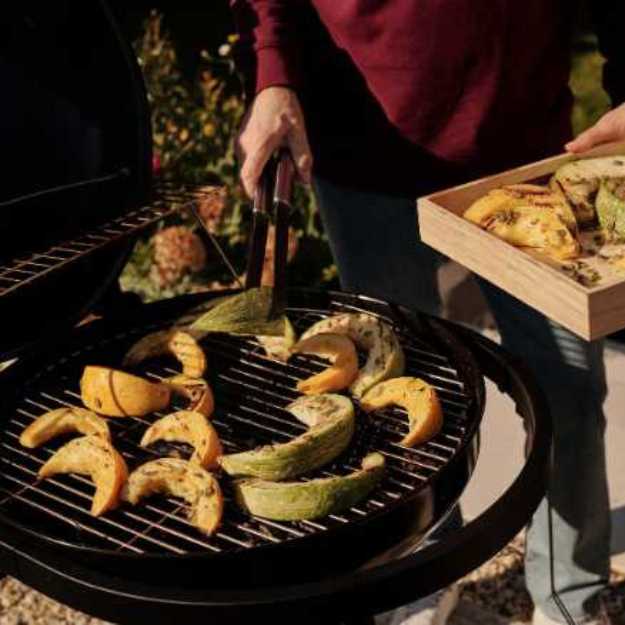 Someone grilling fruits.