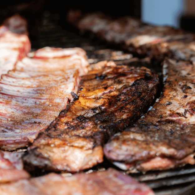 Slabs of rib s on a grill.