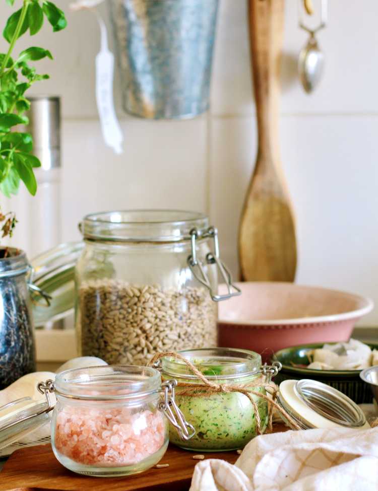 Jars filled with natural ingredients for cooking.