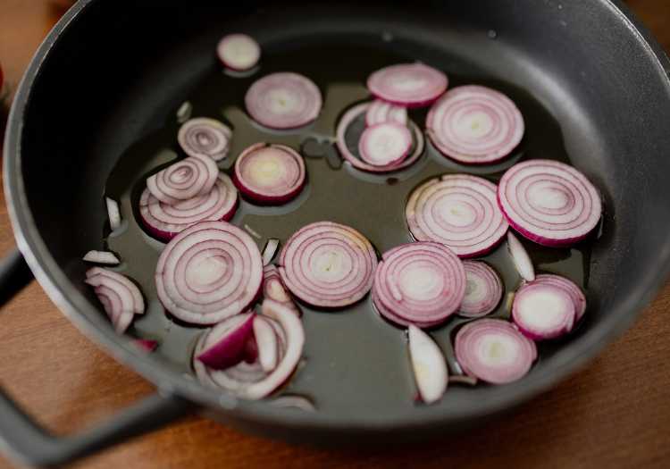 Onions in oil being caramelized! Onions for the prime rib sandwich recipe.
