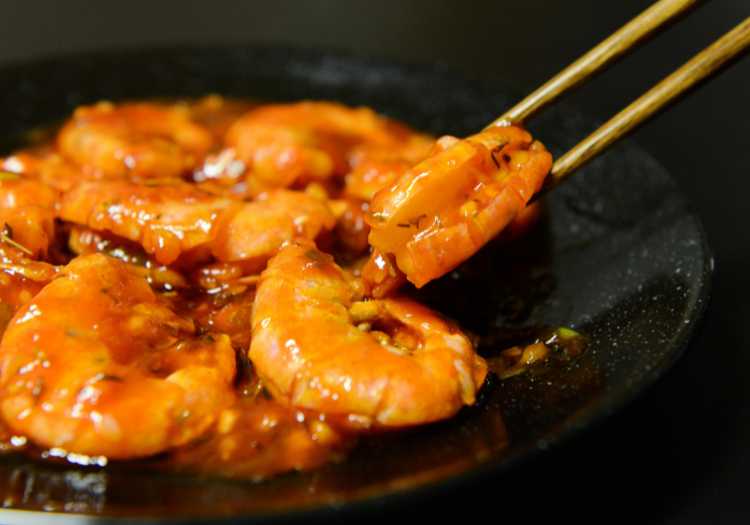 Amazing, juicy, spicy shrimp on a plate ready to be eaten!