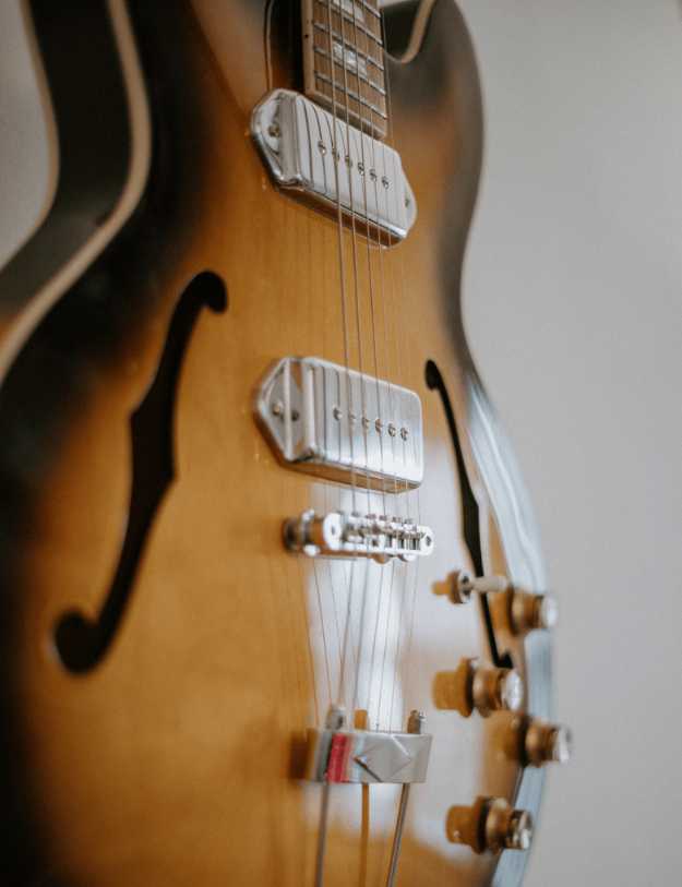 Close up of a an guitar.