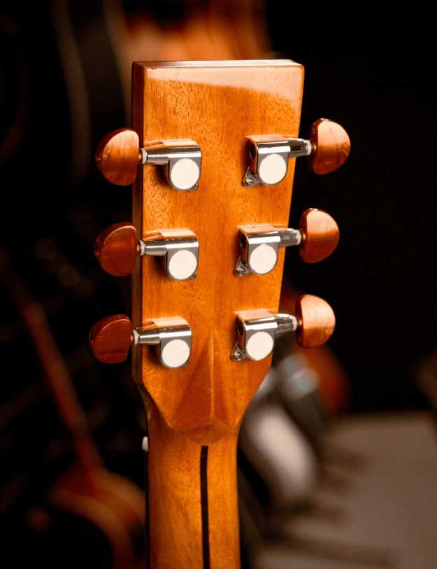 Close up of a guitars back.