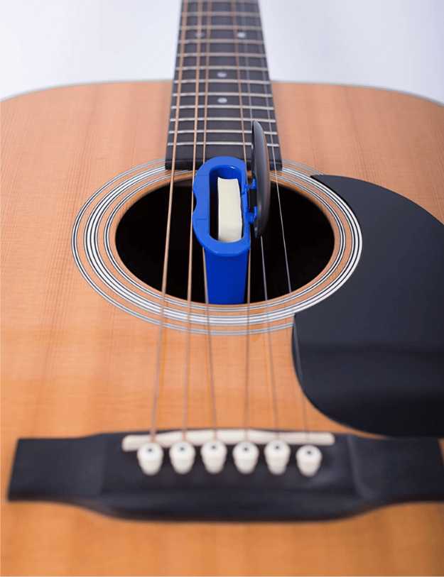 Close up of a humidifier working in a guitar.