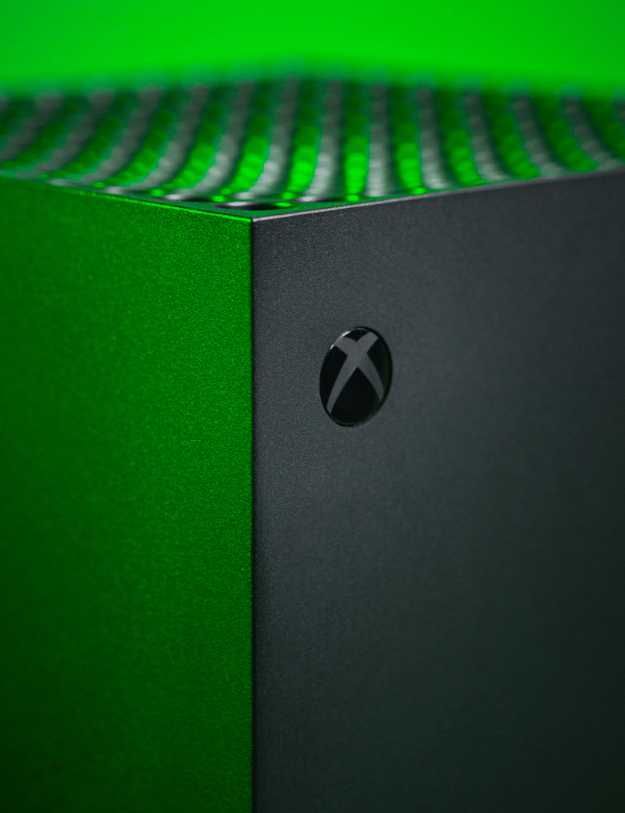 An xbox in green light.